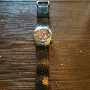 Men’s Kenneth Cole watch.